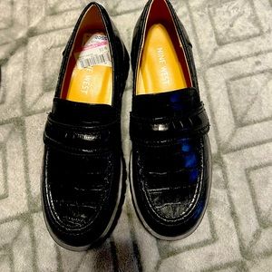 Black crocodile loafers